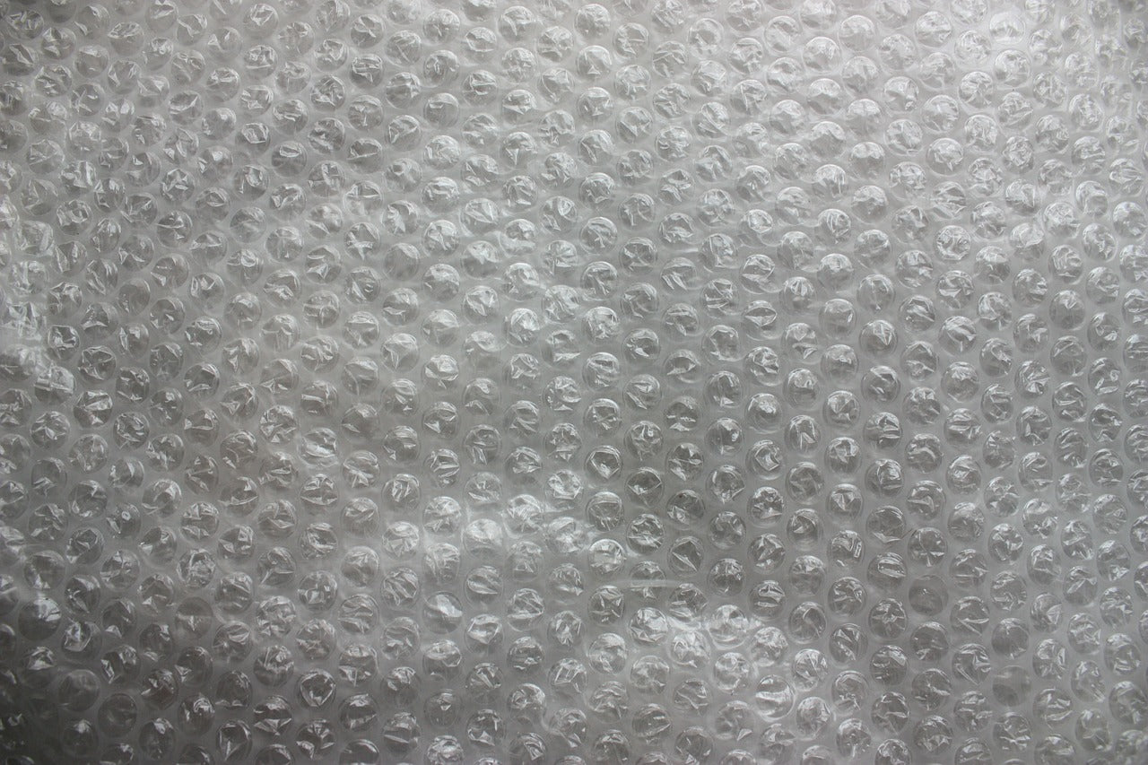 Puis-je couvrir mon bassin de papier (film) bulle pendant la période hivernale?