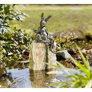 FOUDEBASSIN.COM Hasenpaar sitzend wsp. auf Rosario 580022600 88885.1