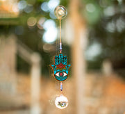 Grand Cristal Feng Shui Hamsa, Protection